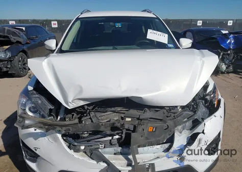 2016 Mazda Cx-5 Touring z USA, uszkodzony, nr VIN JM3KE2CYXG0734721